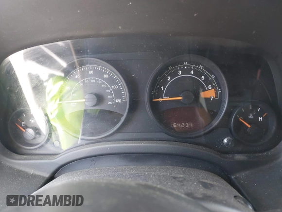 2016 Jeep Compass Sport with VIN 1C4NJCBB2GD577084, listed as a IAAI auction lot 42572348 with 164,234 mi miles and . Bid and sale history available at DreamBid. Image 7.