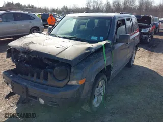 2014 Jeep Patriot Latitude with VIN 1C4NJRFB7ED892604, listed as a IAAI auction lot 41800290 with 111,440 mi miles. Bid and sale history available at carsss.com. Image 2.