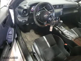 2023 Toyota GR86 Premium with VIN JF1ZNBE10P9765758, listed as a Copart auction lot 72064734 with 9,651 mi miles and Salvage Title. Bid and sale history available at carsss.com. Image 8.