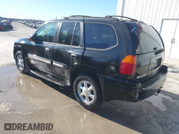 2005 GMC Envoy SLE z VIN 1GKDT13S952288760, wystawiony jako IAAI lot #41671656 z przebiegiem Nie podano mil oraz . Historia ofert i sprzedaży dostępna na DreamBid. Obrazek 3.