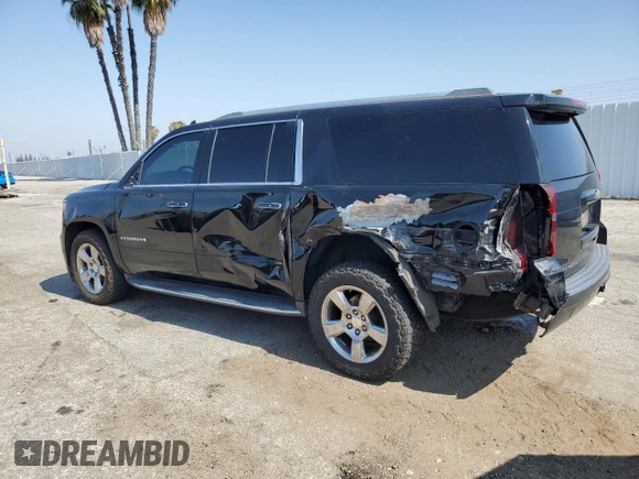 2017 Chevrolet Suburban Premier with VIN 1GNSCJKC8HR226797, listed as a Copart auction lot 62874585 with 150,994 mi miles and Salvage title. Bid and sale history available at DreamBid. Image 2.