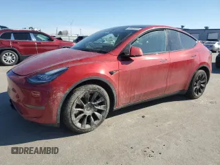 2022 Tesla Model Y Long Range z VIN 7SAYGDEE2NA021645, wystawiony jako Copart lot #46609005 z przebiegiem 57 587 mil mil oraz Szkoda całkowita • Salvage title. Historia ofert i sprzedaży dostępna na DreamBid. Obrazek 1.