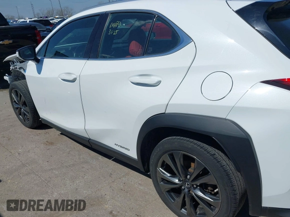 2019 Lexus UX 250h z VIN JTHU9JBH2K2011457, wystawiony jako IAAI lot #41894143 z przebiegiem 55 826 mil mil oraz . Historia ofert i sprzedaży dostępna na DreamBid. Obrazek 14.