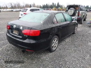 2012 Volkswagen Jetta Sedan SE w/Convenience with VIN 3VWDX7AJ5CM344533, listed as a IAAI auction lot 41805665 with 176,779 mi miles. Bid and sale history available at carsss.com. Image 4.