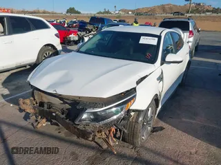 2017 Kia Optima EX z VIN KNAGV4LD5H5017555, wystawiony jako IAAI lot #41414200 z przebiegiem 70 532 mil mil oraz . Historia ofert i sprzedaży dostępna na DreamBid. Obrazek 17.