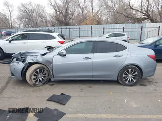 2015 Acura TLX with VIN 19UUB1F3XFA006489, listed as a IAAI auction lot 41352507 with 121,710 mi miles. Bid and sale history available at carsss.com. Image 14.