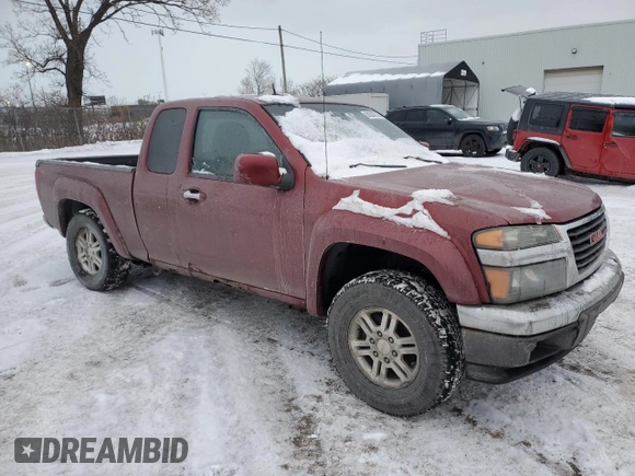 2010 GMC Canyon z VIN 1GTKTFDE5A8123398, wystawiony jako Copart lot #88504215 z przebiegiem 199 472 mil mil oraz Szkoda całkowita • Salvage title. Historia ofert i sprzedaży dostępna na DreamBid. Obrazek 4.