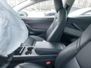 2020 Tesla Model 3 Standard Range Plus with VIN 5YJ3E1EAXLF661031, listed as a Copart auction lot 87912605 with Not Provided miles and Salvage Title. Bid and sale history available at DreamBid. Image 7.