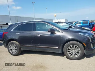 2018 Cadillac XT5 Luxury AWD z VIN 1GYKNDRS0JZ209266, wystawiony jako IAAI lot #42454536 z przebiegiem 52 839 mil mil oraz . Historia ofert i sprzedaży dostępna na DreamBid. Obrazek 13.