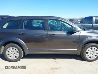 2015 Dodge Journey SE z VIN 3C4PDCAB5FT739266, wystawiony jako IAAI lot #41725086 z przebiegiem 134 109 mil mil oraz . Historia ofert i sprzedaży dostępna na DreamBid. Obrazek 13.