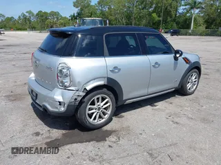2015 MINI Countryman S z VIN WMWZC5C57FWP46371, wystawiony jako IAAI lot #42214115 z przebiegiem 87 234 mil mil oraz . Historia ofert i sprzedaży dostępna na DreamBid. Obrazek 4.