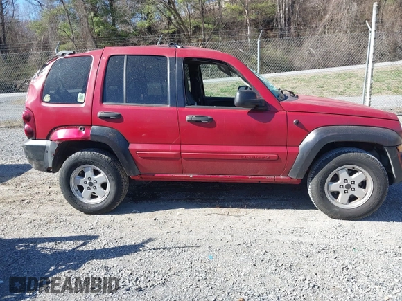 2005 Jeep Liberty Sport with VIN 1J4GL48K35W645419, listed as a IAAI auction lot 41823845 with 168,896 mi miles. Bid and sale history available at carsss.com. Image 13.