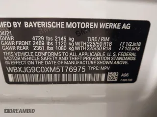 2021 BMW X1 xDrive28i with VIN WBXJG9C0XM5T76975, listed as a IAAI auction lot 41310115 with 26,869 mi miles. Bid and sale history available at carsss.com. Image 9.