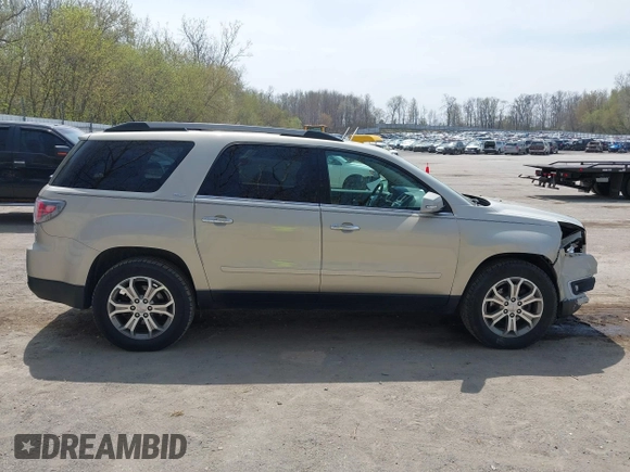 2015 GMC Acadia SLT z VIN 1GKKRSKD2FJ158888, wystawiony jako IAAI lot #42116752 z przebiegiem 156 778 mil mil oraz . Historia ofert i sprzedaży dostępna na DreamBid. Obrazek 13.