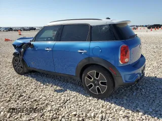 2011 MINI Countryman S with VIN WMWZC5C54BWL53955, listed as a Copart auction lot 52187405 with 124,470 mi miles and Salvage Title. Bid and sale history available at DreamBid. Image 2.