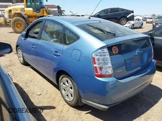 2007 Toyota Prius with VIN JTDKB20U777595187, listed as a IAAI auction lot 42521210 with 226,038 mi miles and . Bid and sale history available at DreamBid. Image 3.