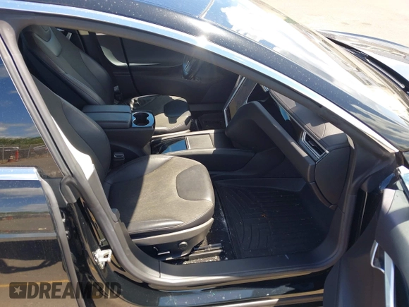 2013 Tesla Model S z VIN 5YJSA1CG0DFP17932, wystawiony jako IAAI lot #42212413 z przebiegiem 76 214 mil mil oraz . Historia ofert i sprzedaży dostępna na DreamBid. Obrazek 5.