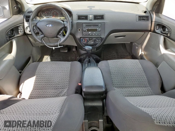 2006 Ford Focus S z VIN 1FAFP34N26W145565, wystawiony jako Copart lot #60091675 z przebiegiem 251 850 mil mil oraz Szkoda całkowita • Salvage title. Historia ofert i sprzedaży dostępna na DreamBid. Obrazek 8.