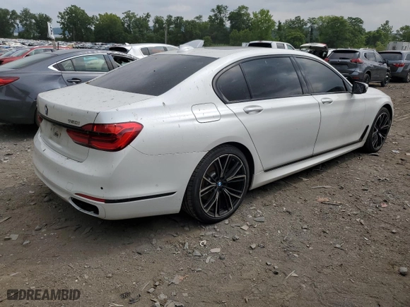 2018 BMW 7 Series 750i xDrive with VIN WBA7F2C56JB238650, listed as a Copart auction lot 64738314 with 96,889 mi miles and Salvage Title. Bid and sale history available at carsss.com. Image 3.