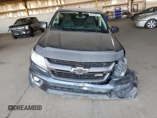 2019 Chevrolet Colorado 2WD Z71 z VIN 1GCGSDEA1K1119917, wystawiony jako Copart lot #60749825 z przebiegiem 64 762 mil mil oraz Szkoda całkowita • Salvage title. Historia ofert i sprzedaży dostępna na DreamBid. Obrazek 5.