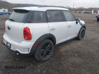 2012 MINI Countryman S with VIN WMWZC5C52CWM12275, listed as a IAAI auction lot 42014546 with 147,494 mi miles and . Bid and sale history available at DreamBid. Image 4.