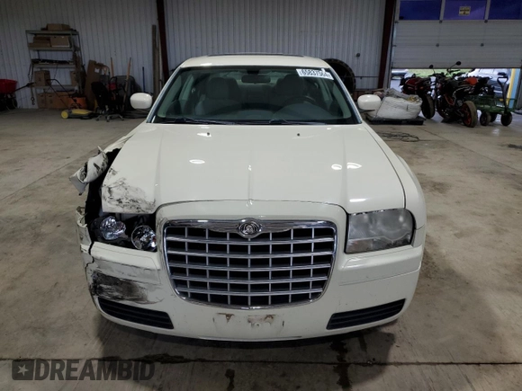 2007 Chrysler 300 with VIN 2C3LA43R37H879385, listed as a Copart auction lot 65837564 with 144,062 mi miles and Salvage Title. Bid and sale history available at carsss.com. Image 5.