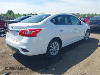 2019 Nissan Sentra S z VIN 3N1AB7AP6KY413233, wystawiony jako IAAI lot #42281572 z przebiegiem 111 297 mil mil oraz . Historia ofert i sprzedaży dostępna na DreamBid. Obrazek 4.
