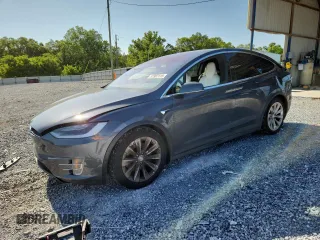 2017 Tesla Model X 90D z VIN 5YJXCBE22HF060645, wystawiony jako Copart lot #57907115 z przebiegiem 55 343 mil mil oraz Szkoda całkowita • Salvage title. Historia ofert i sprzedaży dostępna na DreamBid. Obrazek 1.