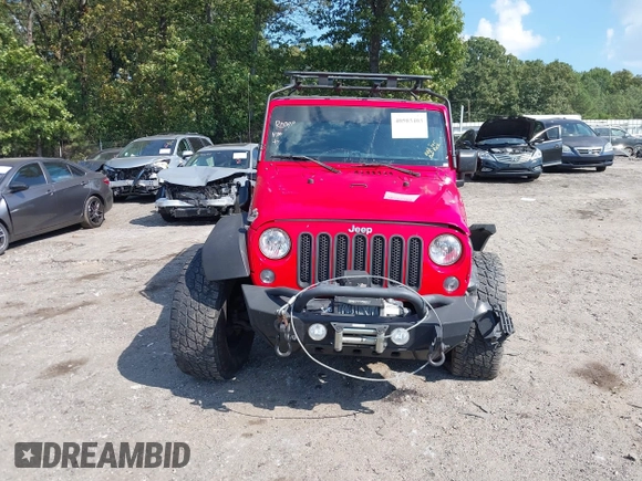 2016 Jeep Wrangler Unlimited Rubicon with VIN 1C4HJWFG7GL128994, listed as a IAAI auction lot 40503403 with 85,950 mi miles. Bid and sale history available at carsss.com. Image 12.