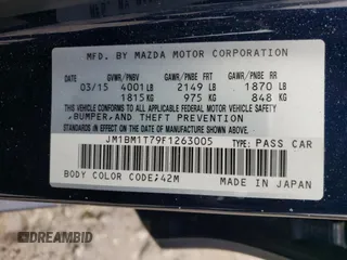 2015 Mazda 3 i SV z VIN JM1BM1T79F1263005, wystawiony jako Copart lot #52374195 z przebiegiem 58 186 mil mil oraz Czysty tytuł • Clean title. Historia ofert i sprzedaży dostępna na DreamBid. Obrazek 14.