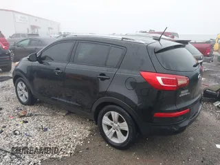 2011 Kia Sportage LX with VIN KNDPB3A25B7027733, listed as a IAAI auction lot 38570270 with 186,271 mi miles and . Bid and sale history available at carsss.com. Image 3.