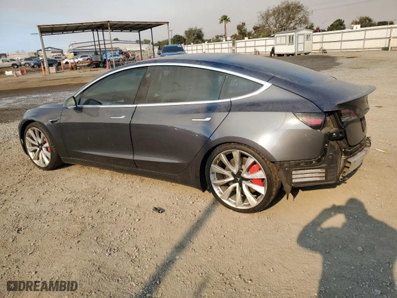 2019 Tesla Model 3 Long Range with VIN 5YJ3E1EB0KF238370, listed as a Copart auction lot 42452465 with 60,857 mi miles and Salvage Title. Bid and sale history available at carsss.com. Image 2.