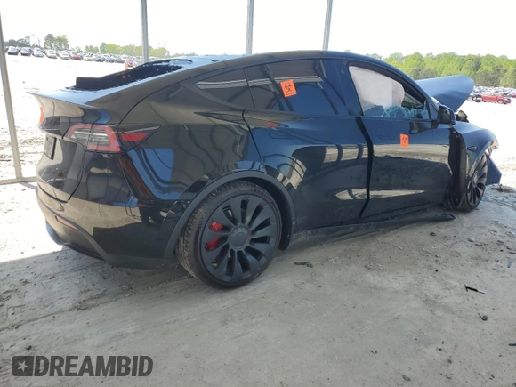 2022 Tesla Model Y Performance z VIN 7SAYGDEF2NF448013, wystawiony jako Copart lot #52323435 z przebiegiem Nie podano mil oraz Nie do naprawy • Non repairable. Historia ofert i sprzedaży dostępna na DreamBid. Obrazek 3.