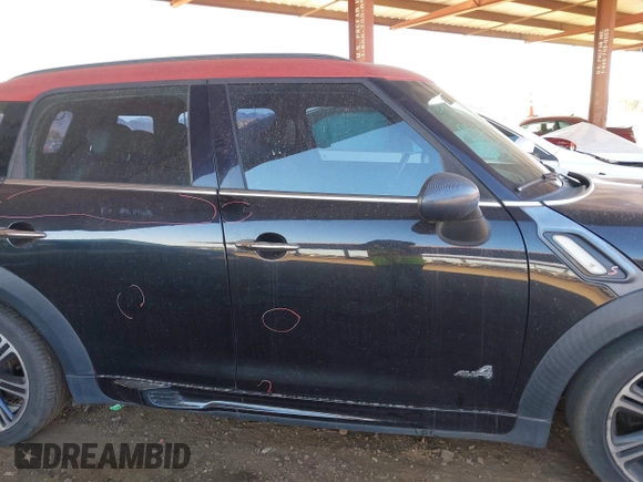 2014 MINI Countryman S with VIN WMWZC5C57EWP39919, listed as a IAAI auction lot 41613909 with 139,138 mi miles and . Bid and sale history available at DreamBid. Image 14.