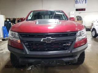 2020 Chevrolet Colorado 4WD ZR2 with VIN 1GCGTEEN6L1108483, listed as a Copart auction lot 87216404 with 27,520 mi miles and Salvage title. Bid and sale history available at DreamBid. Image 5.