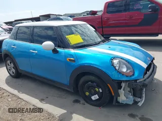 2017 MINI Hardtop 4 Door Cooper with VIN WMWXU1C53H2E17614, listed as a IAAI auction lot 41686204 with 53,409 mi miles and . Bid and sale history available at DreamBid. Image 14.