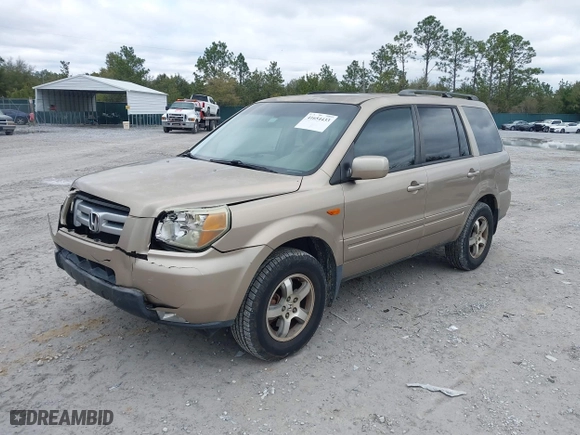 2006 Honda Pilot EX-L with VIN 5FNYF28566B010295, listed as a IAAI auction lot 41654433 with 302,539 mi miles. Bid and sale history available at carsss.com. Image 17.
