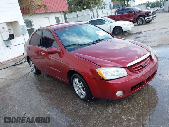 2004 Kia Spectra LX with VIN KNAFE121545021648, listed as a IAAI auction lot 41842471 with 211,436 mi miles. Bid and sale history available at carsss.com. Image 1.