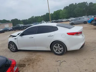 2017 Kia Optima LX z VIN KNAGT4L32H5149511, wystawiony jako IAAI lot #42087537 z przebiegiem 126 666 mil mil oraz . Historia ofert i sprzedaży dostępna na DreamBid. Obrazek 14.