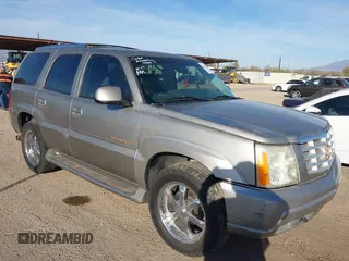 2002 Cadillac Escalade z VIN 1GYEK63N22R101463, wystawiony jako IAAI lot #41621840 z przebiegiem 156 639 mil mil oraz . Historia ofert i sprzedaży dostępna na DreamBid. Obrazek 1.