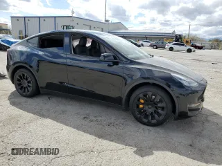 2021 Tesla Model Y Long Range with VIN 5YJYGDEEXMF188737, listed as a Copart auction lot 49117605 with 49,201 mi miles and Salvage Title. Bid and sale history available at DreamBid. Image 4.