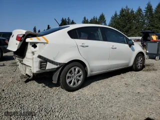 2016 Kia Rio LX with VIN KNADM4A39G6558973, listed as a Copart auction lot 54064515 with 118,066 mi miles and Salvage Title. Bid and sale history available at carsss.com. Image 3.