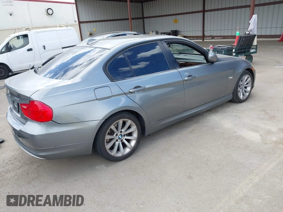 2011 BMW 3 Series 328i with VIN WBAPH5G52BNM84035, listed as a IAAI auction lot 42046301 with 165,418 mi miles. Bid and sale history available at carsss.com. Image 4.