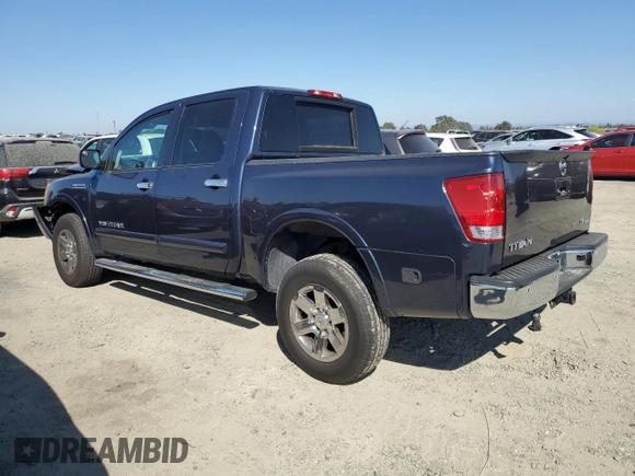2015 Nissan Titan SL with VIN 1N6BA0EC1FN506809, listed as a Copart auction lot 72825514 with 132,830 mi miles and Salvage Title. Bid and sale history available at carsss.com. Image 2.