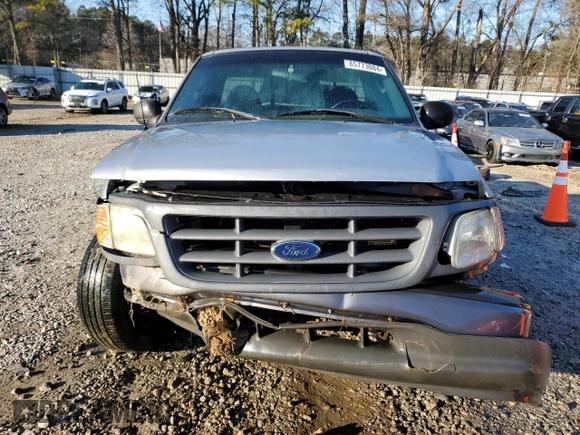 2002 Ford F-150 XL with VIN 1FTRF17202NB11513, listed as a Copart auction lot 85773084 with 120,443 mi miles and Salvage Title. Bid and sale history available at carsss.com. Image 5.