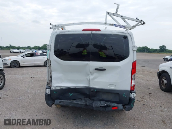 2016 Ford Transit Cargo with VIN 1FTYE1ZM6GKA95971, listed as a IAAI auction lot 42412181 with 243,171 mi miles and . Bid and sale history available at DreamBid. Image 16.