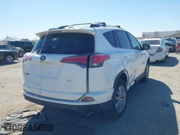 2016 Toyota RAV4 LE with VIN 2T3ZFREV2GW291072, listed as a IAAI auction lot 41831444 with 135,820 mi miles. Bid and sale history available at carsss.com. Image 4.