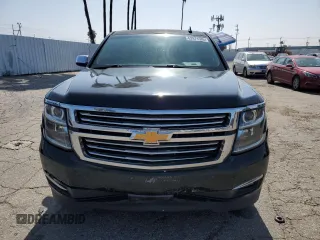 2017 Chevrolet Suburban Premier with VIN 1GNSCJKC8HR226797, listed as a Copart auction lot 62874585 with 150,994 mi miles and Salvage title. Bid and sale history available at DreamBid. Image 5.