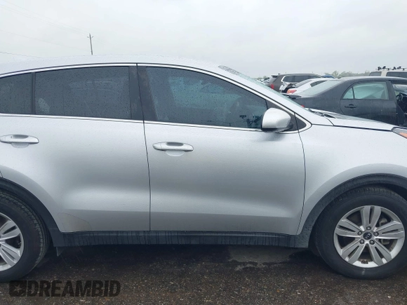 2018 Kia Sportage LX with VIN KNDPM3AC7J7337951, listed as a IAAI auction lot 41900482 with 105,857 mi miles and . Bid and sale history available at carsss.com. Image 13.