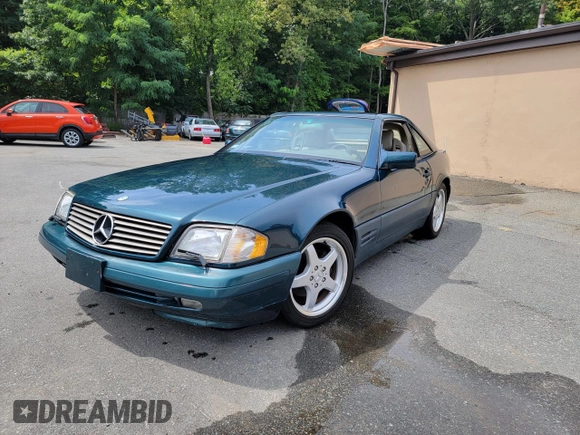 1996 Mercedes-Benz SL-Class with VIN WDBFA67F1TF130955, listed as a Copart auction lot 54483495 with 97,732 mi miles and Clean Title. Bid and sale history available at carsss.com. Image 2.